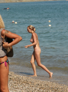 Girl not shy being nude at the beach